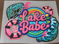 Lake Babe shirt decal with rainbow waves life rings lightning bolts and wave dragon in neon pink teal and purple