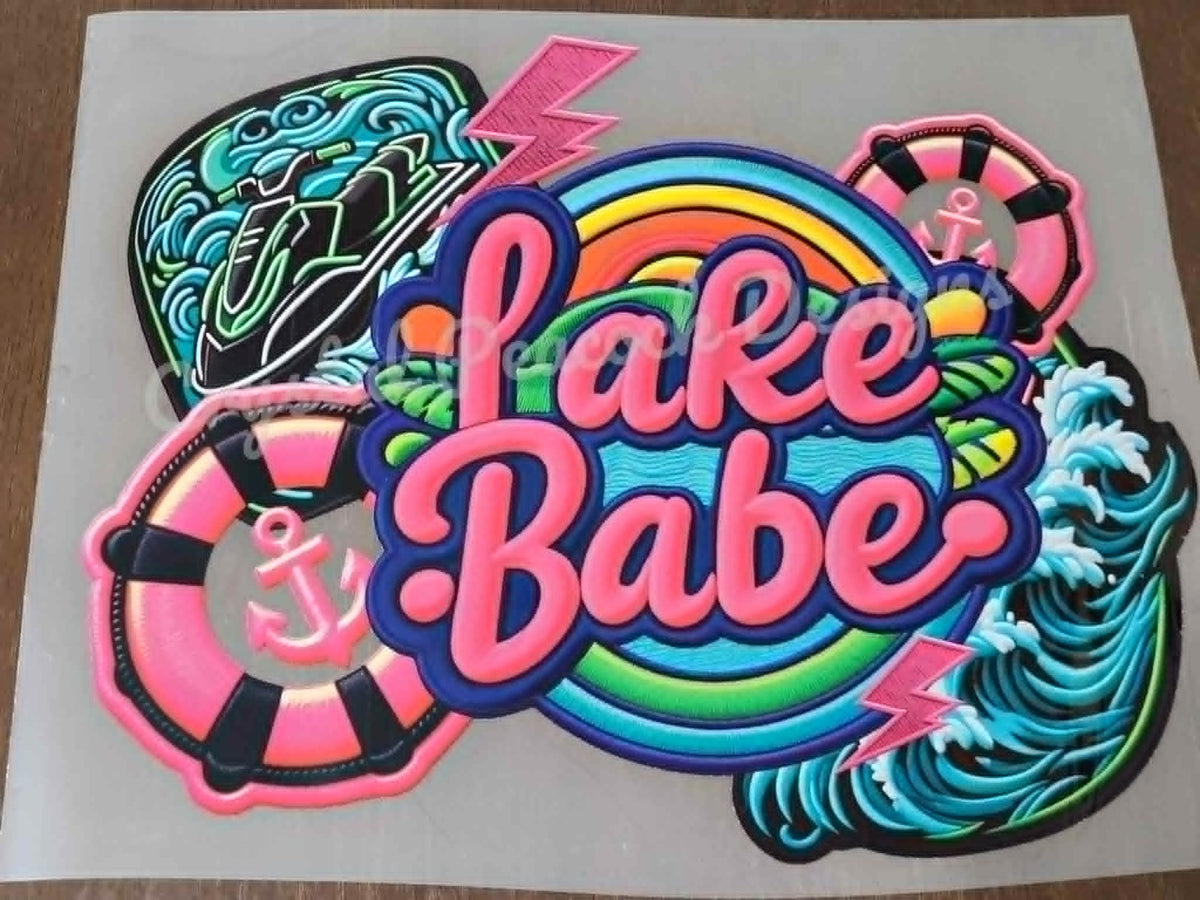Lake Babe shirt decal with rainbow waves life rings lightning bolts and wave dragon in neon pink teal and purple