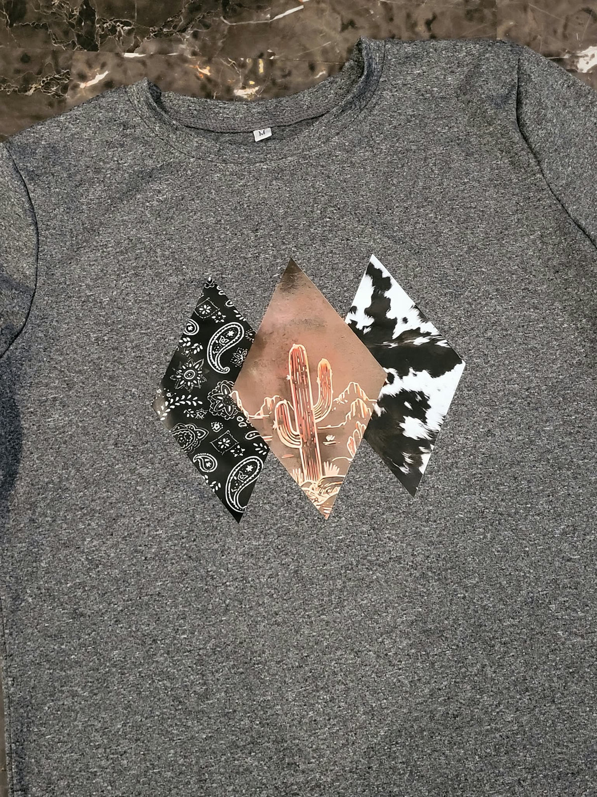 Gray western shirt with paisley, cactus sunset, and cow print diamond design