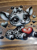 Baby Giraffe with Bow and Heart Decal - black and white baby giraffe with sparkling eyes bow and red heart surrounded by giraffe print hearts