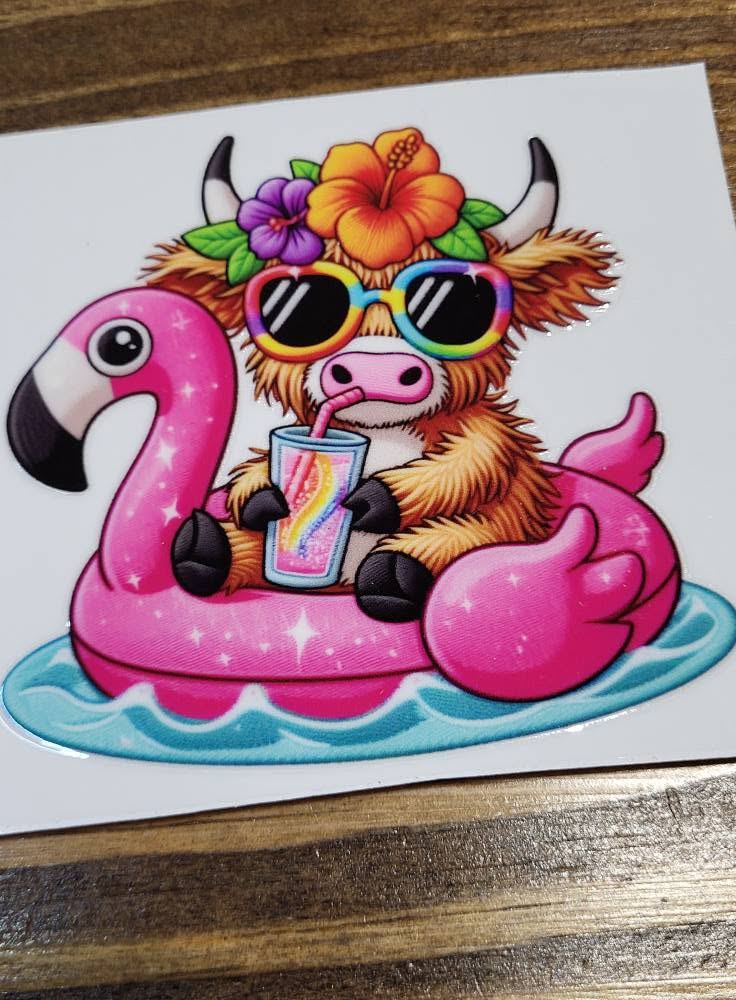 Highland Cow Flamingo Float Decal - fluffy highland cow in pink flamingo float with rainbow sunglasses and hibiscus flowers