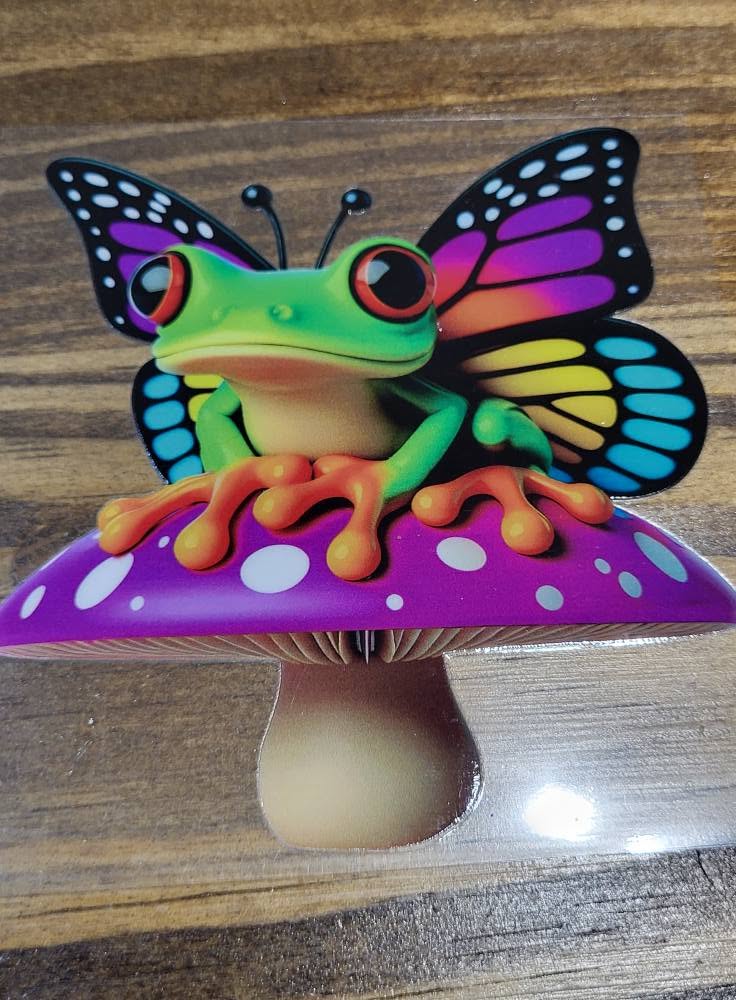 Rainbow Butterfly Frog on Purple Mushroom Decal - green tree frog with red eyes and rainbow butterfly wings perched on purple polka dot mushroom
