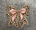 Leopard Print Rhinestone Bow - glamorous leopard print bow with soft pink ribbon center sparkling rhinestone knot and rhinestone trim edging