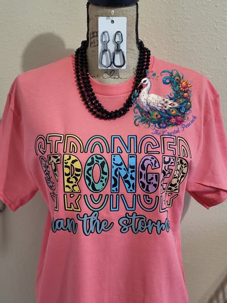 Stronger Than the Storm leopard print decal on coral pink shirt