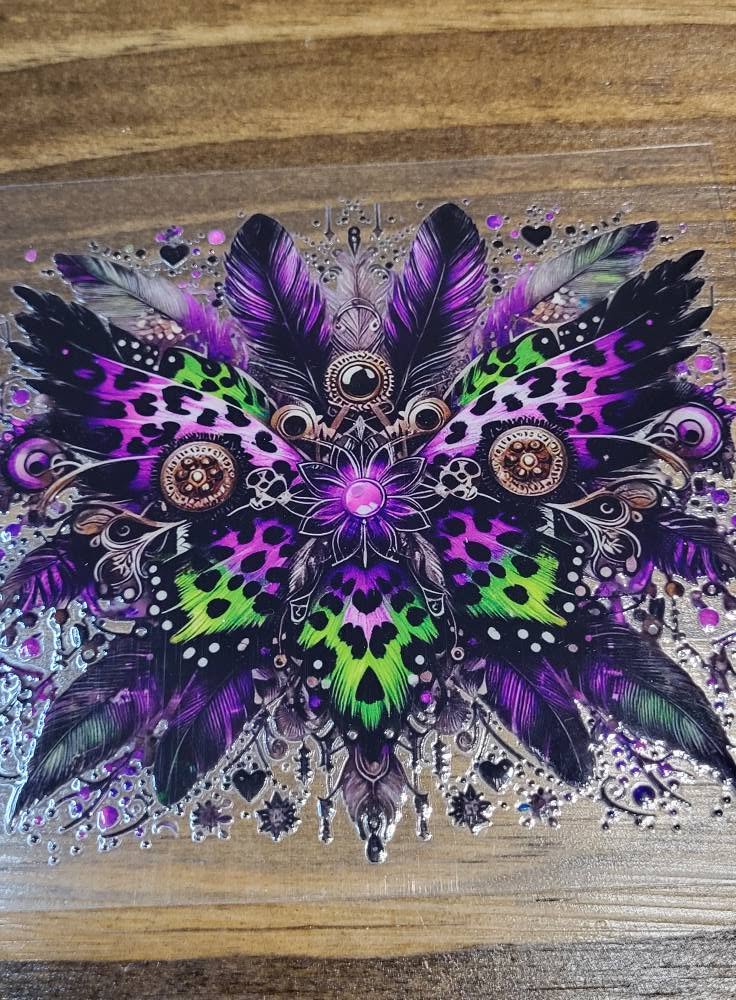 Purple Leopard Butterfly Mandala Feather Decal - symmetrical mandala with purple neon green leopard butterfly wings black feathers steampunk bronze gears and pink lotus center