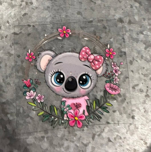 Baby Koala Blue Eyes Pink Bow Floral Wreath Decal - fluffy gray baby koala with big blue eyes pink polka dot bow inside pink floral circular wreath
