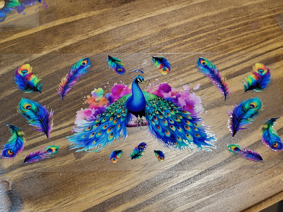Rainbow Peacock Full Display with Scattered Feathers Wrap Decal - majestic peacock in full tail display with iridescent plumage purple pink watercolor background and scattered rainbow feathers