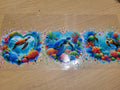 Sea Turtle Coral Reef Glitter Wrap Decal - three sea turtles swimming through vibrant rainbow coral reefs with heart-shaped coral frame sparkling glitter bubbles and lush sea anemones