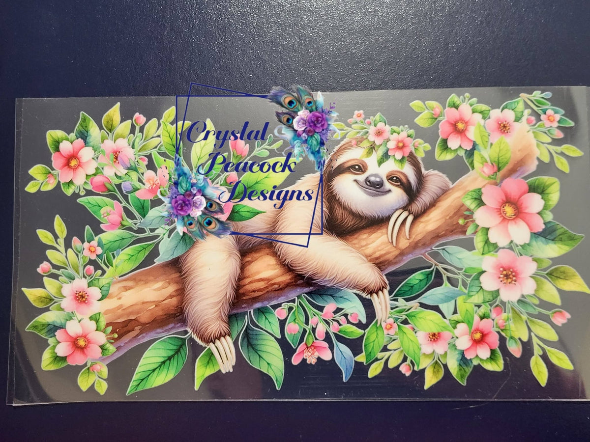 Smiling Sloth on Floral Branch Wrap Decal - content smiling sloth draped over branch surrounded by pink cherry blossoms and lush green leaves