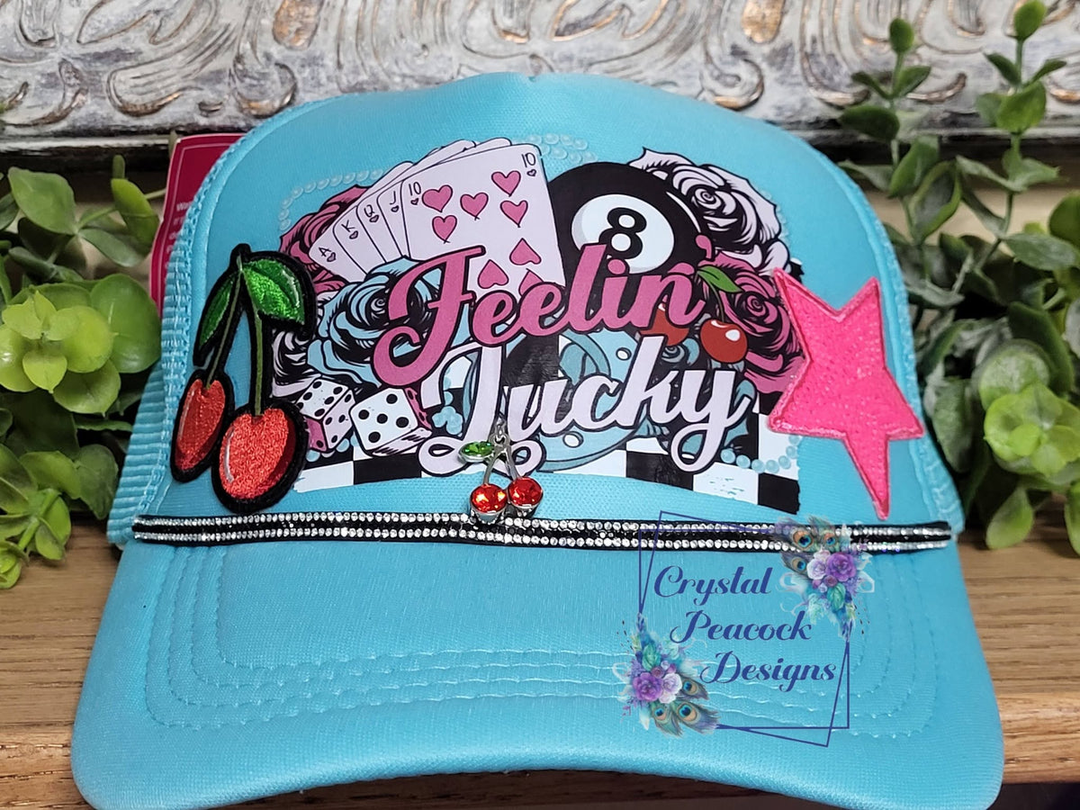 Feelin Lucky Trucker Hat in Teal with retro graphic and rhinestone trim