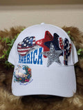 America Cowgirl white ponytail hat with rhinestone and sequin star patches and patriotic graphic