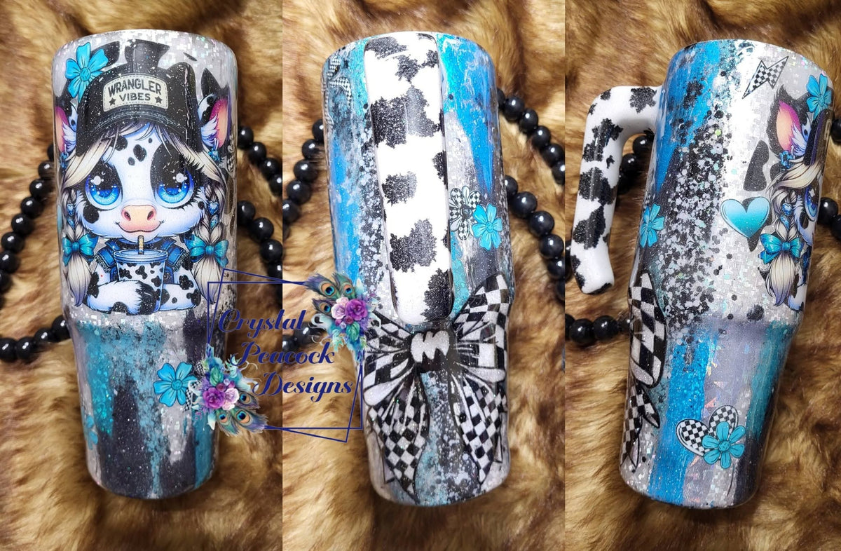 Cowgirl Cutie 30oz Tumbler - turquoise black white silver glitter foil base with sassy Wrangler Vibes cow girl decal checkerboard bow and cow print embellishments