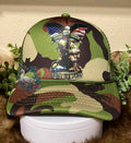 Honoring Our Heroes green camo trucker hat with kneeling soldier and American flag graphic