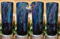 Western Northern Lights 25oz Glow Tumbler - northern lights with cowboy and cowgirl at a cross and glow stars