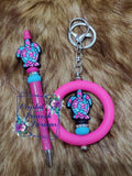 Bright pink and turquoise turtle beaded pen and wristlet keychain set by Crystal Peacock Designs
