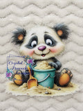 Beach Panda with Sand Bucket and Shovel Decal - delighted fluffy panda with big googly eyes and rosy cheeks digging into teal sand bucket with yellow shovel nearby