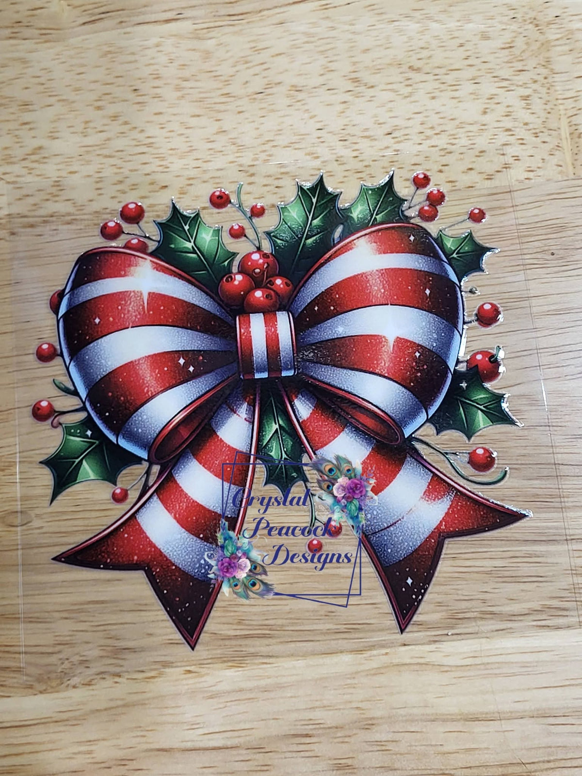 Christmas Holly Candy Cane Bow - candy cane striped bow with glossy holly leaves and bright red berries holiday design