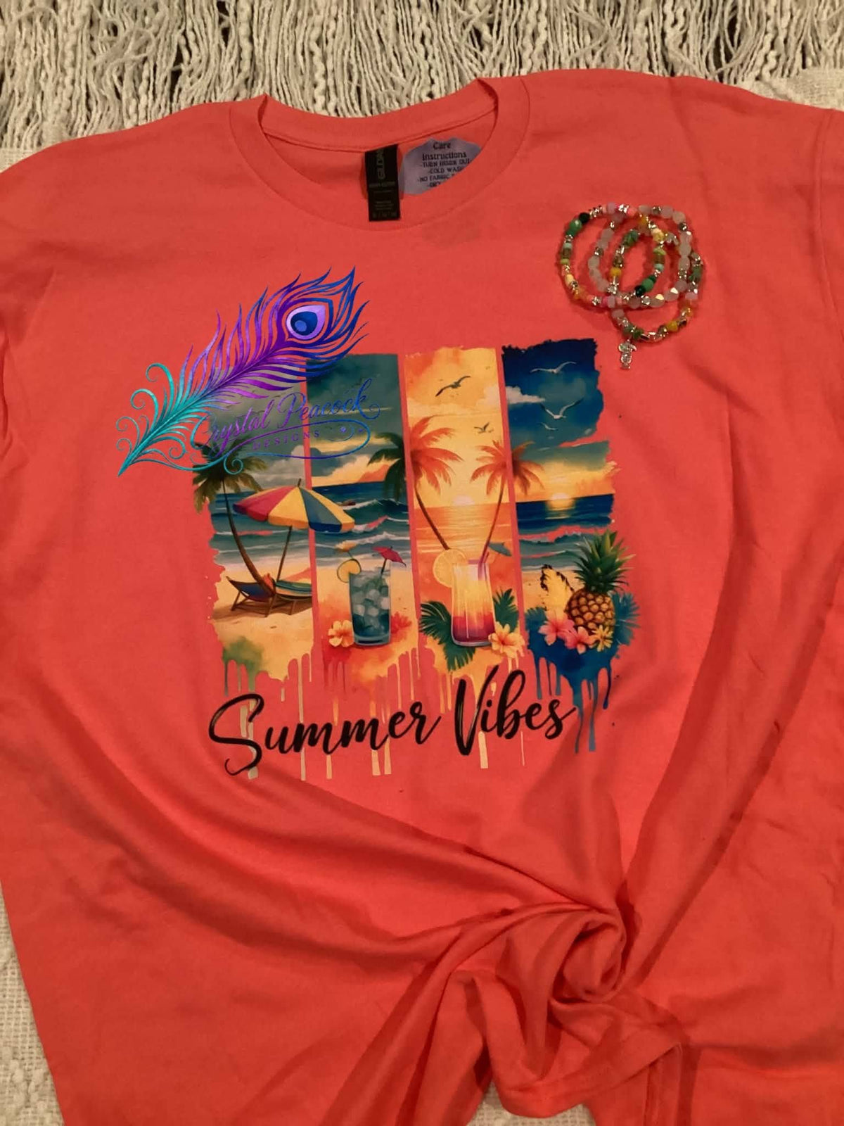 Summer Vibes beach scene graphic tee on coral shirt