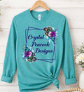 Peacock Floral Long Sleeve Tee in Teal with Crystal Peacock Designs logo
