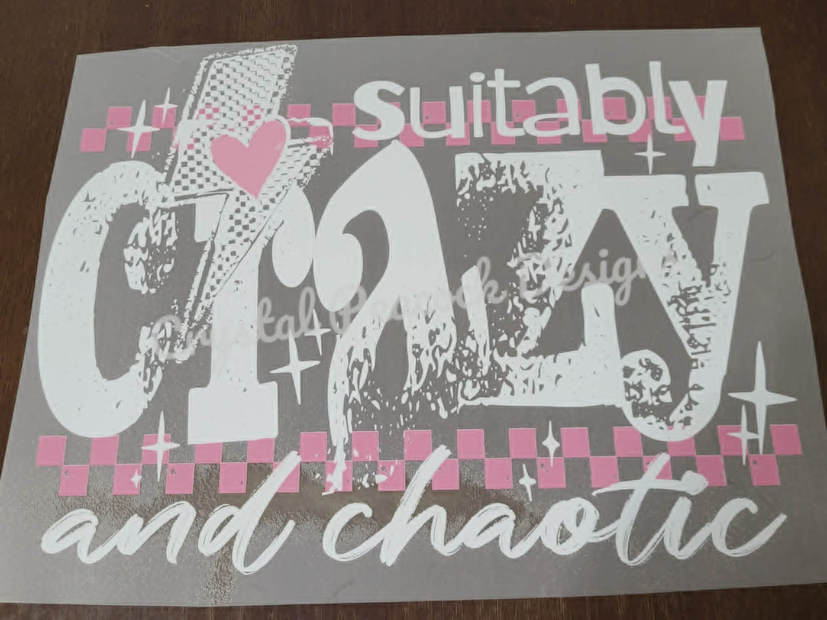 Suitably Crazy and Chaotic bold distressed white grunge lettering with pink checkered borders and heart shirt decal