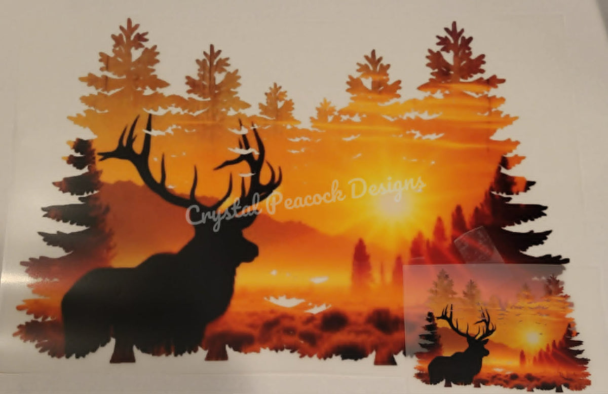 Golden sunset elk forest front and back shirt decal with bull elk silhouette and pine trees in amber and orange tones